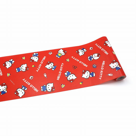 a red roll of paper with a repeating pattern of Hello Kitty characters on it.
