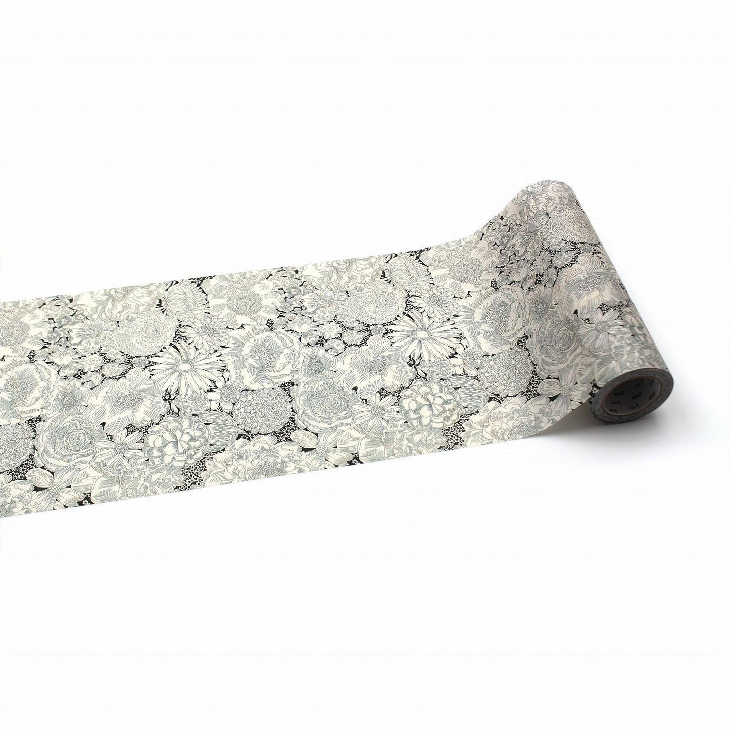 a roll of paper with a floral pattern on it, placed on a white background.