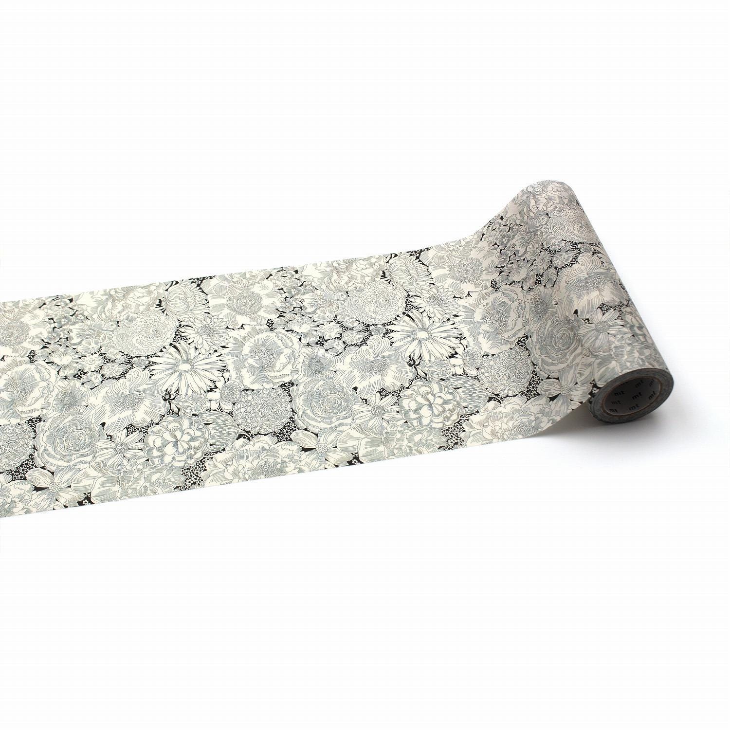 a roll of paper with a floral pattern on it, placed on a white background.