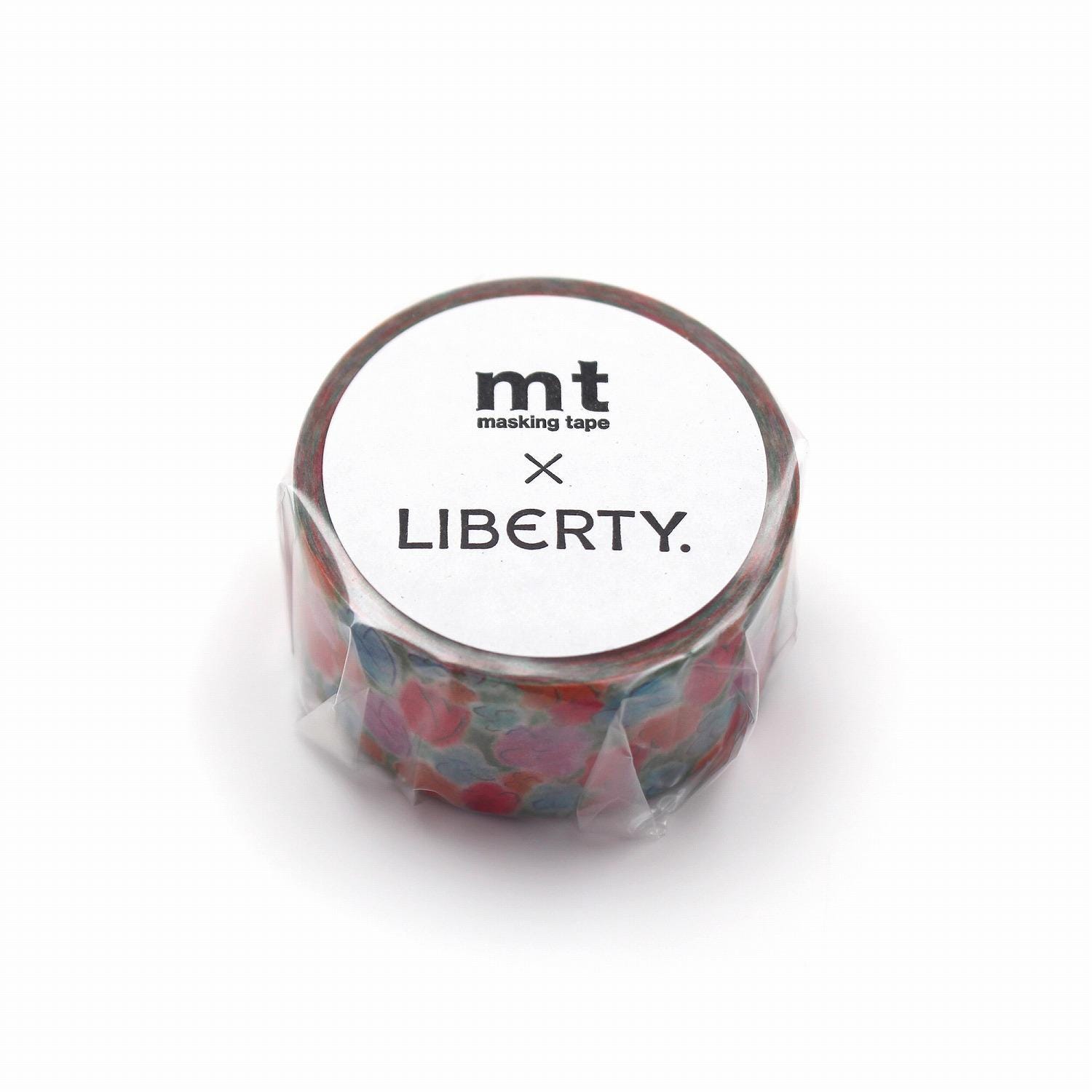 A round, white, and colorful masking tape roll with the text "mt masking tape LIBERTY" printed on it.