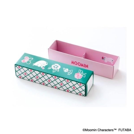 A pink and green box with a floral pattern and the word "Moomin" printed on it.