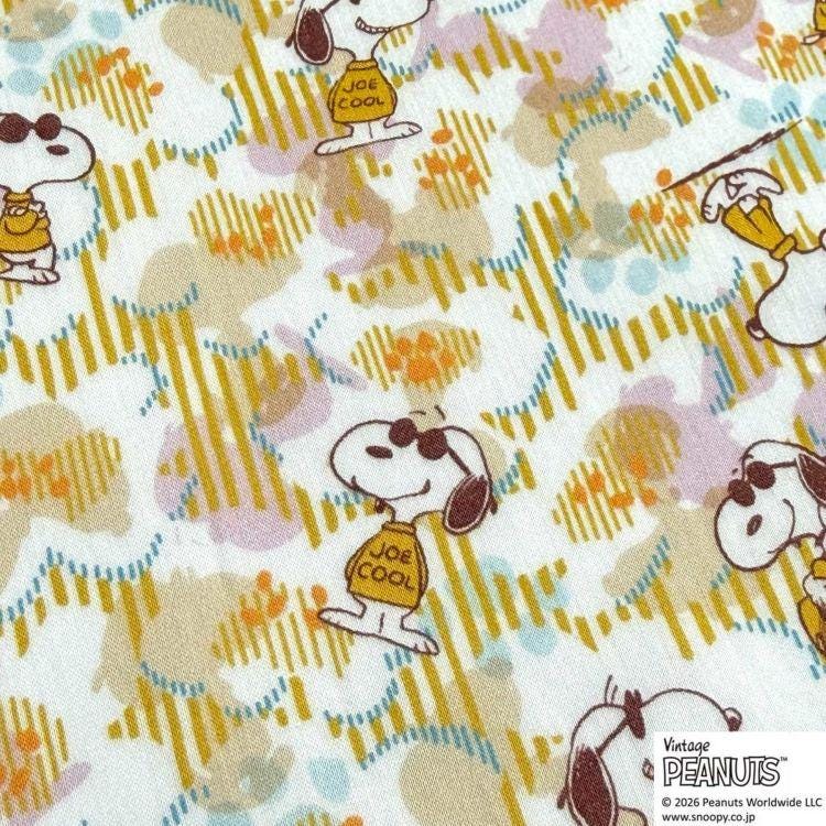 a repeating pattern of cartoon characters, including Snoopy, the beloved Peanuts character, wearing sunglasses and holding a sign that says "Job Cool".