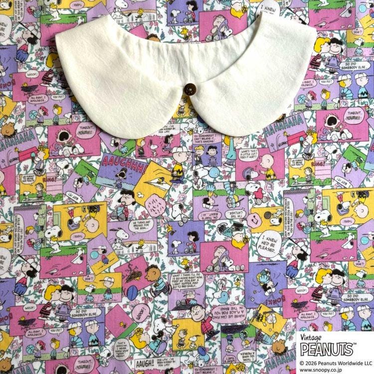 The image is a collage of various Peanuts comic strip panels, featuring characters such as Snoopy, Charlie Brown, and Peanuts. The collage is set against a background with a white collar, creating a visually interesting and playful composition.