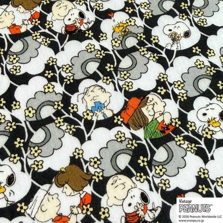 The image is a collage of various Peanuts characters, including Snoopy, Woodstock, and Charlie Brown, all depicted in a playful and colorful manner.