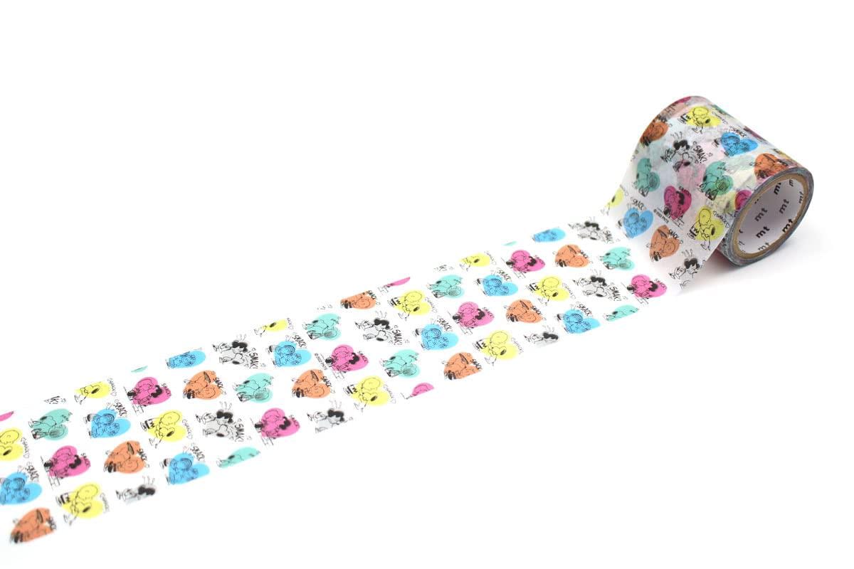 A roll of colorful patterned tape with a repeating design of cartoon animal faces on it.