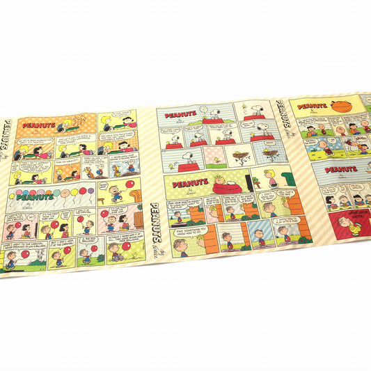 The image is a collage of various Peanuts comic strip panels, featuring characters such as Snoopy, Charlie Brown, and other beloved Peanuts characters.