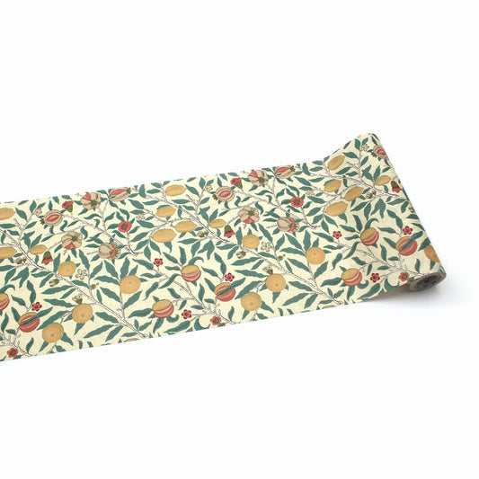 a roll of paper with a repeating pattern of green leaves and orange fruits, such as pomegranates, on a white background.