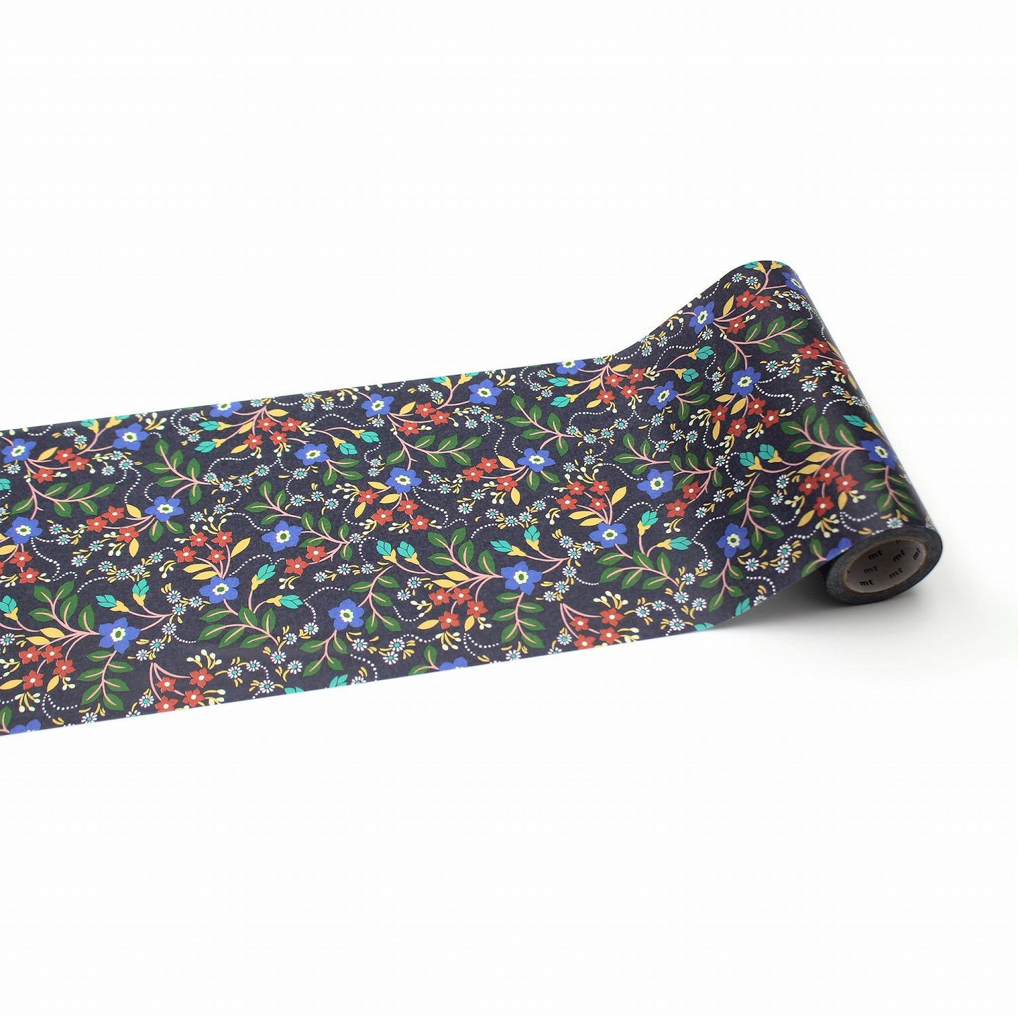 A roll of decorative paper with a floral pattern on it.