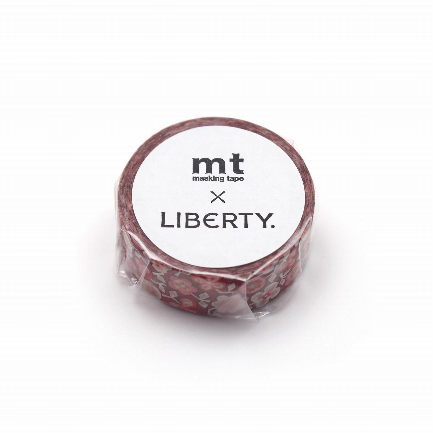 A roll of red and white patterned masking tape with the text "mt masking tape LIBERTY" printed on it.