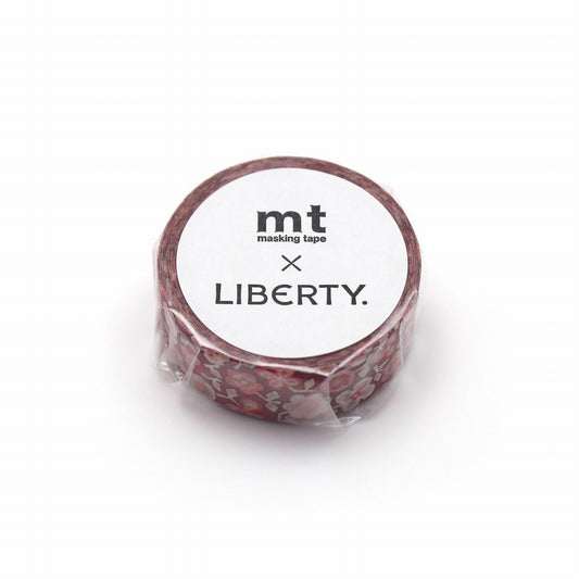 A roll of red and white patterned masking tape with the text "mt masking tape LIBERTY" printed on it.