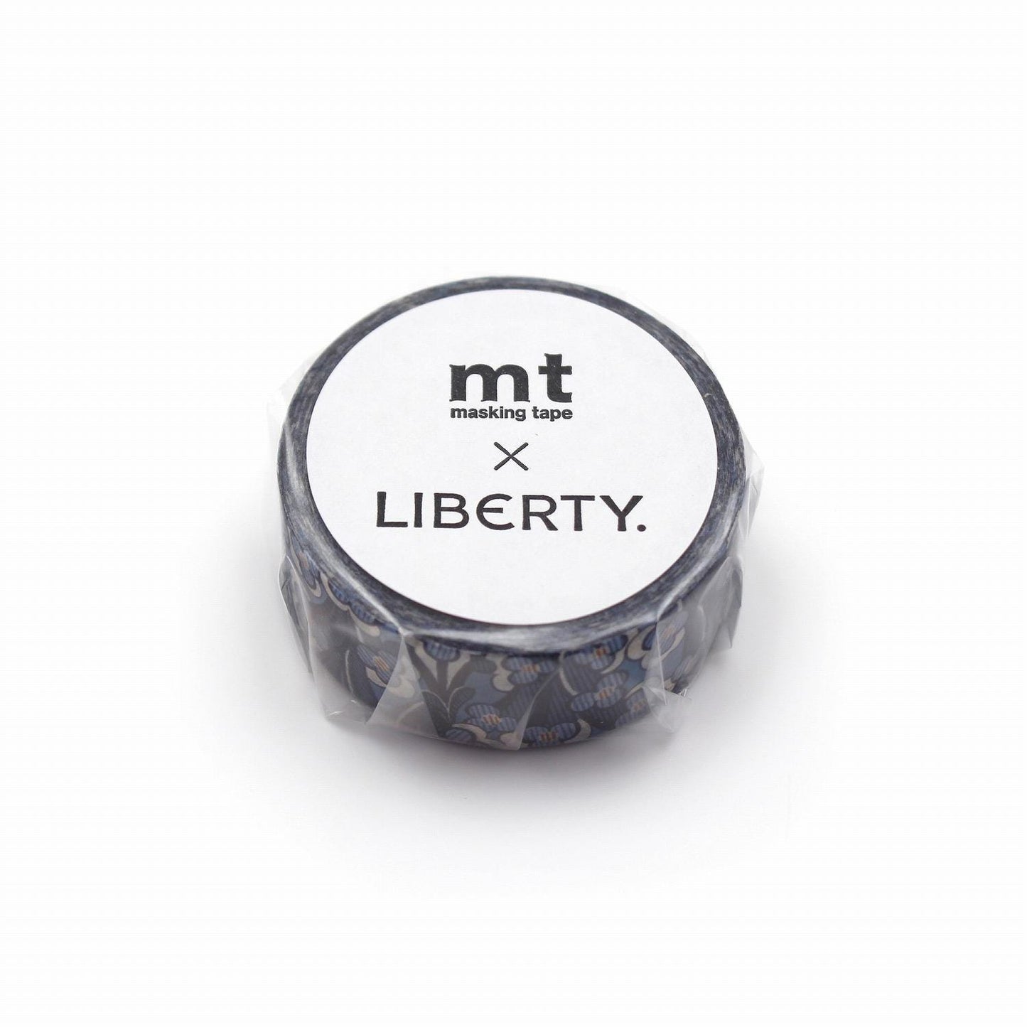 A round, black and white tape dispenser with the text "mt masking tape LIBERTY." printed on it.