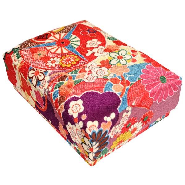 a colorful, patterned box with a variety of flowers and designs.