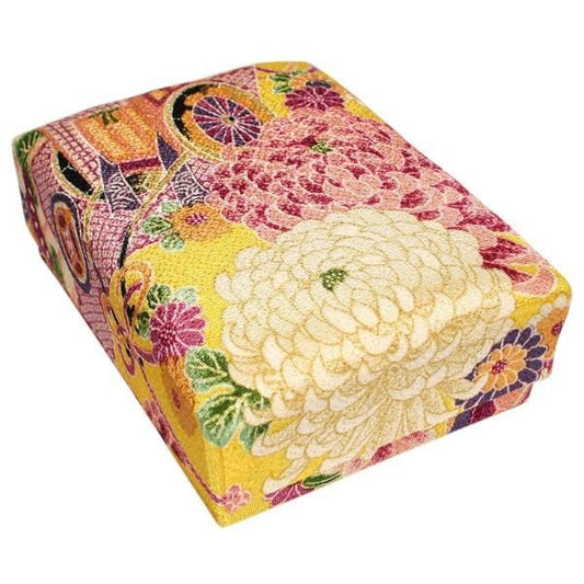 a colorful, patterned box with a floral design.