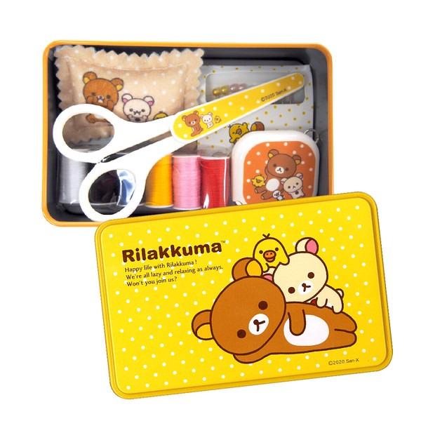 A yellow tin box containing various craft supplies, including scissors, a sewing kit, and other tools, with a cartoon bear design on the lid.