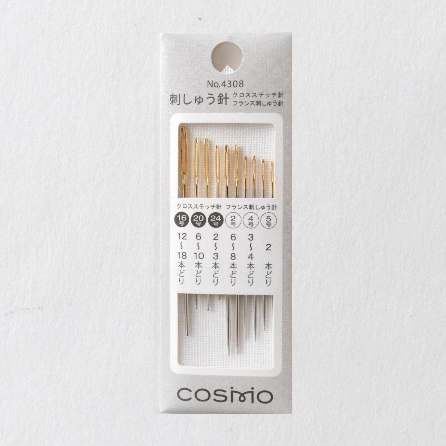 A package containing a set of gold needles with the number 4308 printed on it.