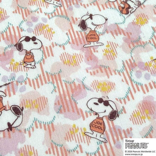 a repeating pattern of cartoon characters, including Snoopy, the beloved Peanuts character, wearing sunglasses and a "Love Cool" shirt.