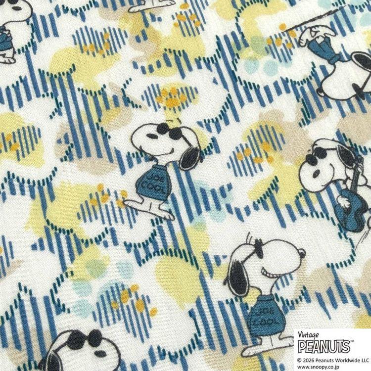 a repeating pattern of cartoon characters, including Snoopy, the beloved Peanuts character, wearing sunglasses and holding a guitar.