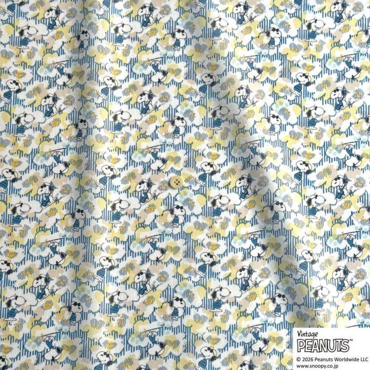 a repeating pattern of cartoon characters, likely from the Peanuts comic strip, on a fabric or material.