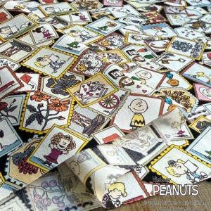 a collage of various cartoon character images, including Peanuts characters, arranged in a visually appealing manner.