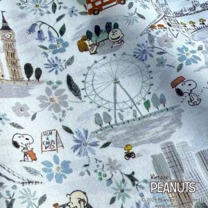 The image is a collage of various cartoon characters and scenes, including Snoopy, Big Ben, a ferris wheel, and other iconic landmarks and symbols.