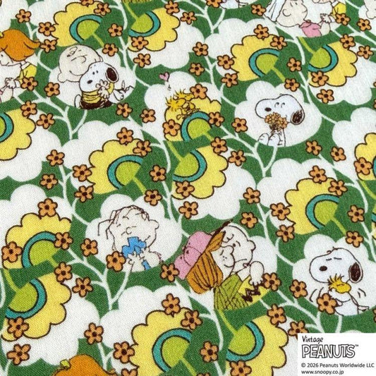The image is a collage of various Peanuts characters, including Snoopy, Woodstock, and other beloved Peanuts characters, all set against a background of colorful flowers and leaves.