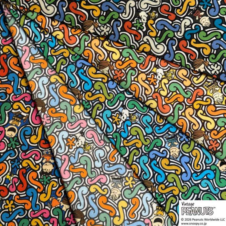 The image is a collage of various colorful and abstract patterns, including swirls, flowers, and other shapes, creating a vibrant and dynamic visual effect.