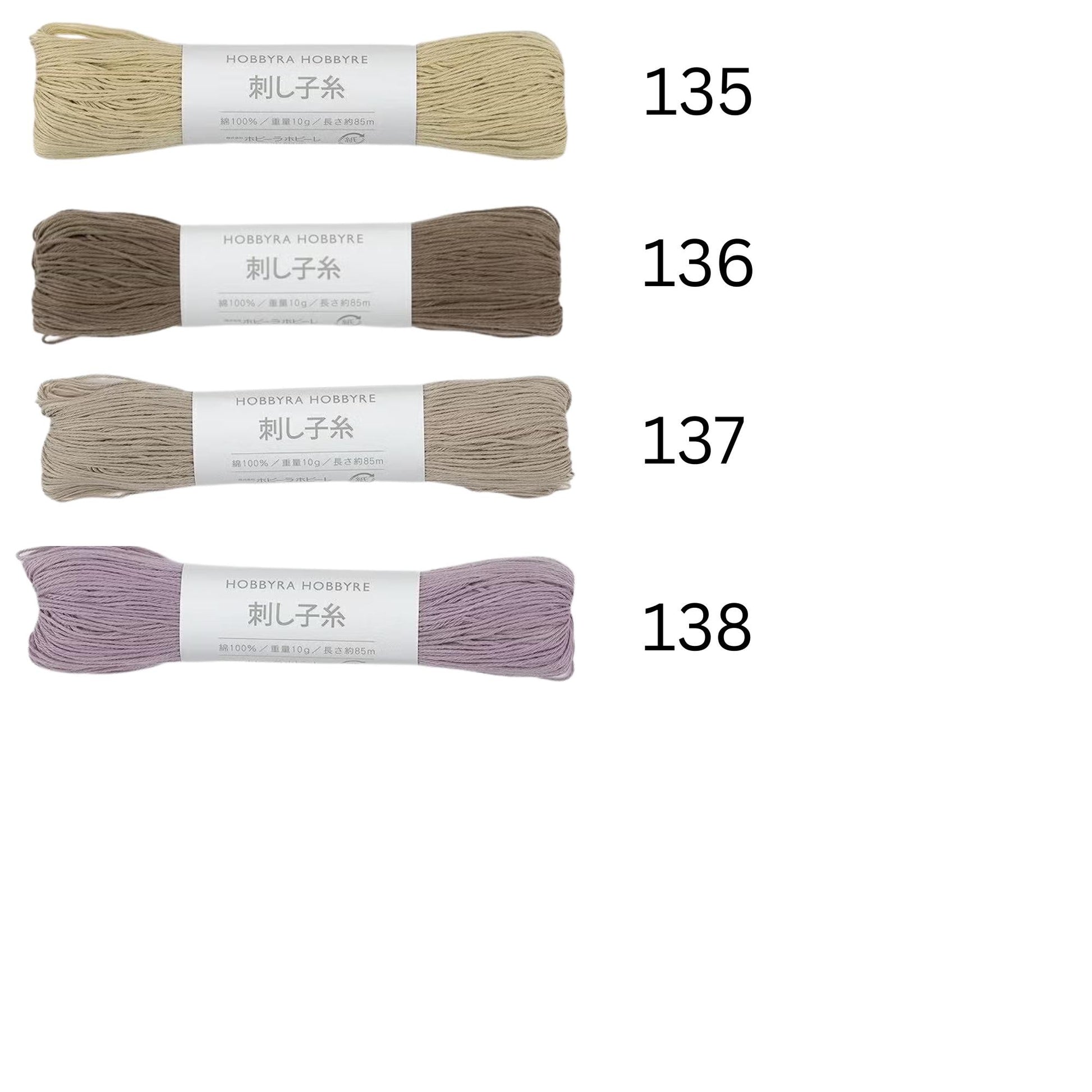 four spools of thread, each with a different color and labeled with the number 135.