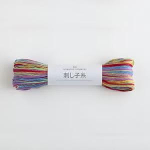 A spool of multicolored yarn with a label that reads "HOBBYISHER YARN" and "麦芽" (which means "cross-stitch" in English).