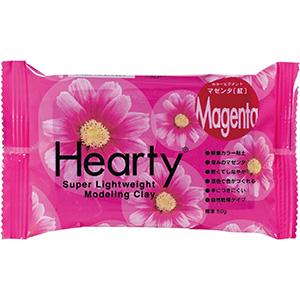 A package of pink modeling clay with a flower design on it.