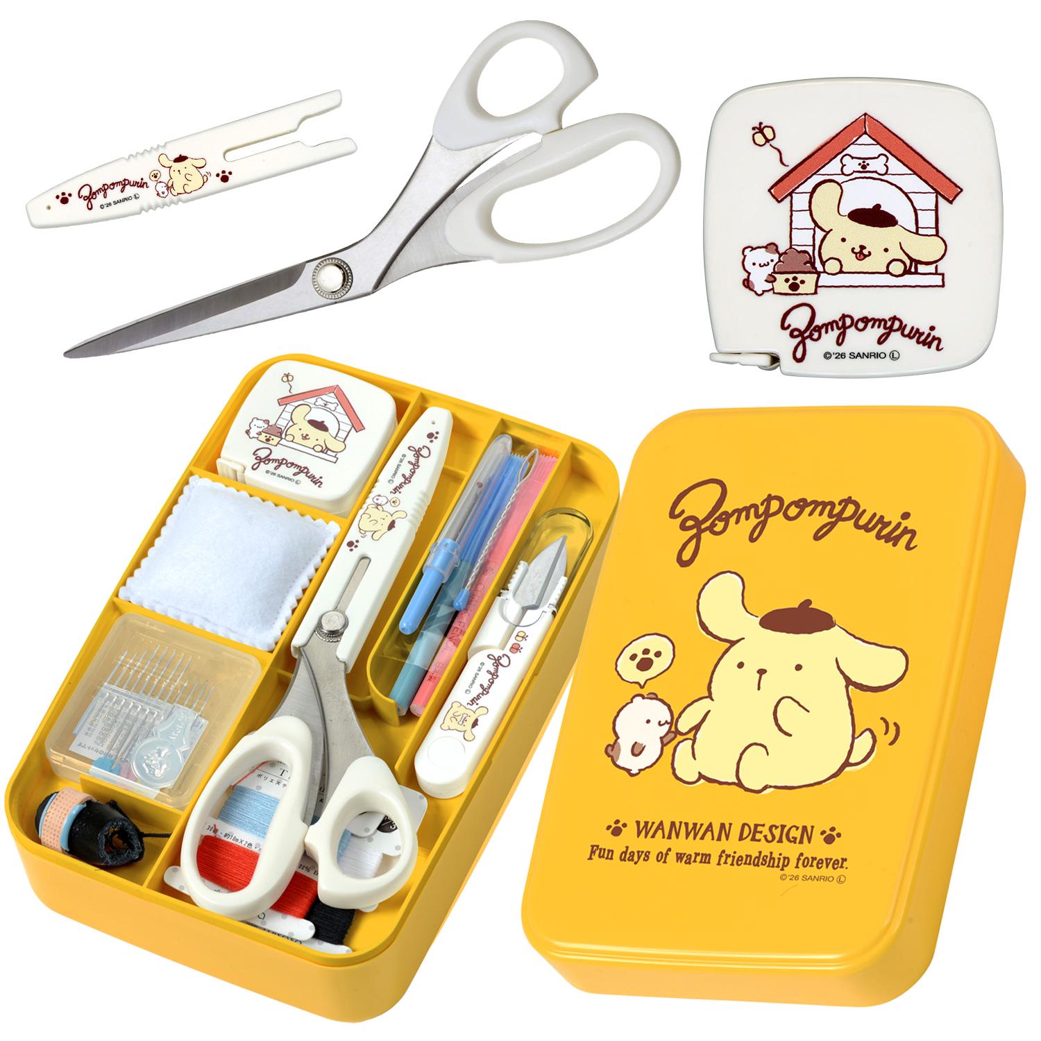various sewing and crafting supplies, including scissors, a yellow container, and a small box with a cartoon character design.