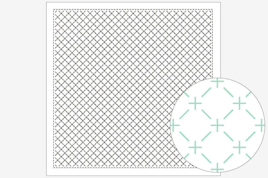 a square with a grid pattern and a circular pattern with green crosses on it.
