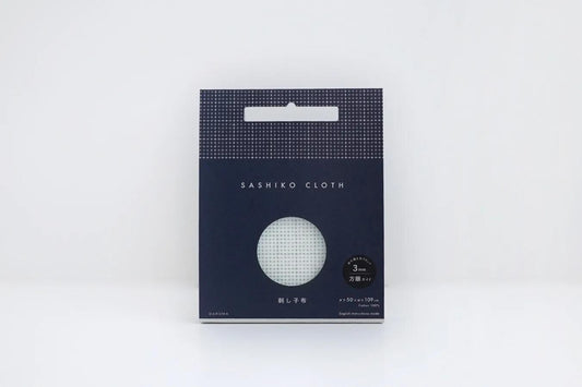 A package of Sashiko cloth, which is a type of fabric. The package is dark blue with a white circular design on the front.