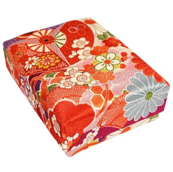 a colorful, patterned box with a floral design.