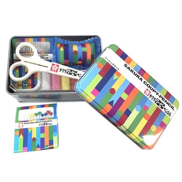 A colorful pencil set with a pair of scissors and a small box with a patterned design.