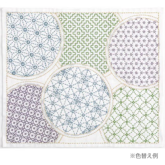 The image is a collage of various circular patterns and designs, featuring a mix of geometric and floral motifs. The patterns include a variety of colors and shapes, creating a visually appealing and diverse composition.