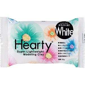 A package of white modeling clay with a colorful flower design on the front.