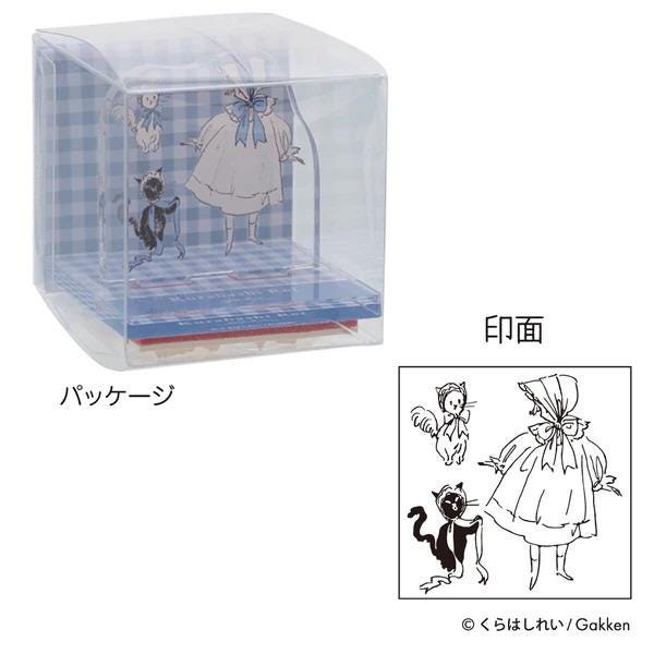 a clear plastic box with a blue and white checkered pattern, and there are illustrations of two characters, one of which is a woman wearing a dress and a bonnet. The image also includes a smaller illustration of the same characters.