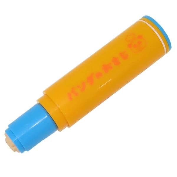 A yellow and blue toy with red text on it.