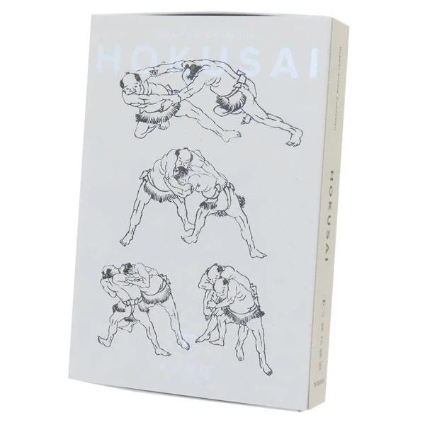 The image is a book cover with a series of black and white illustrations depicting various fighting stances and techniques.