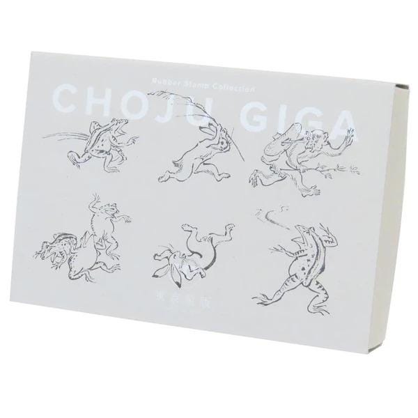 a collection of six black and white line drawings of various animals, including a frog, a rabbit, and other creatures.