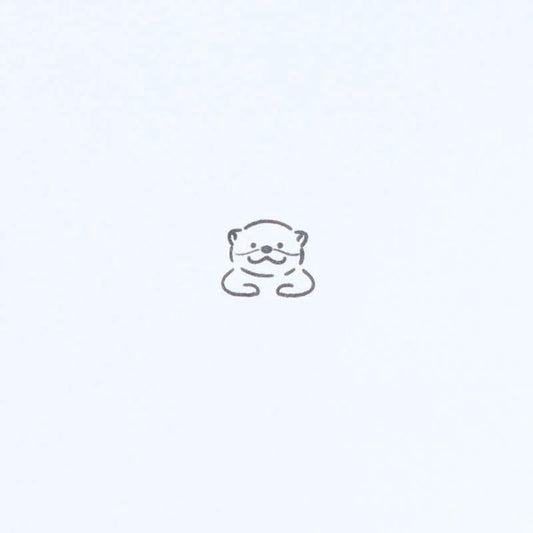 A simple line drawing of a small animal, likely a cat or a dog, with a small smile on its face.