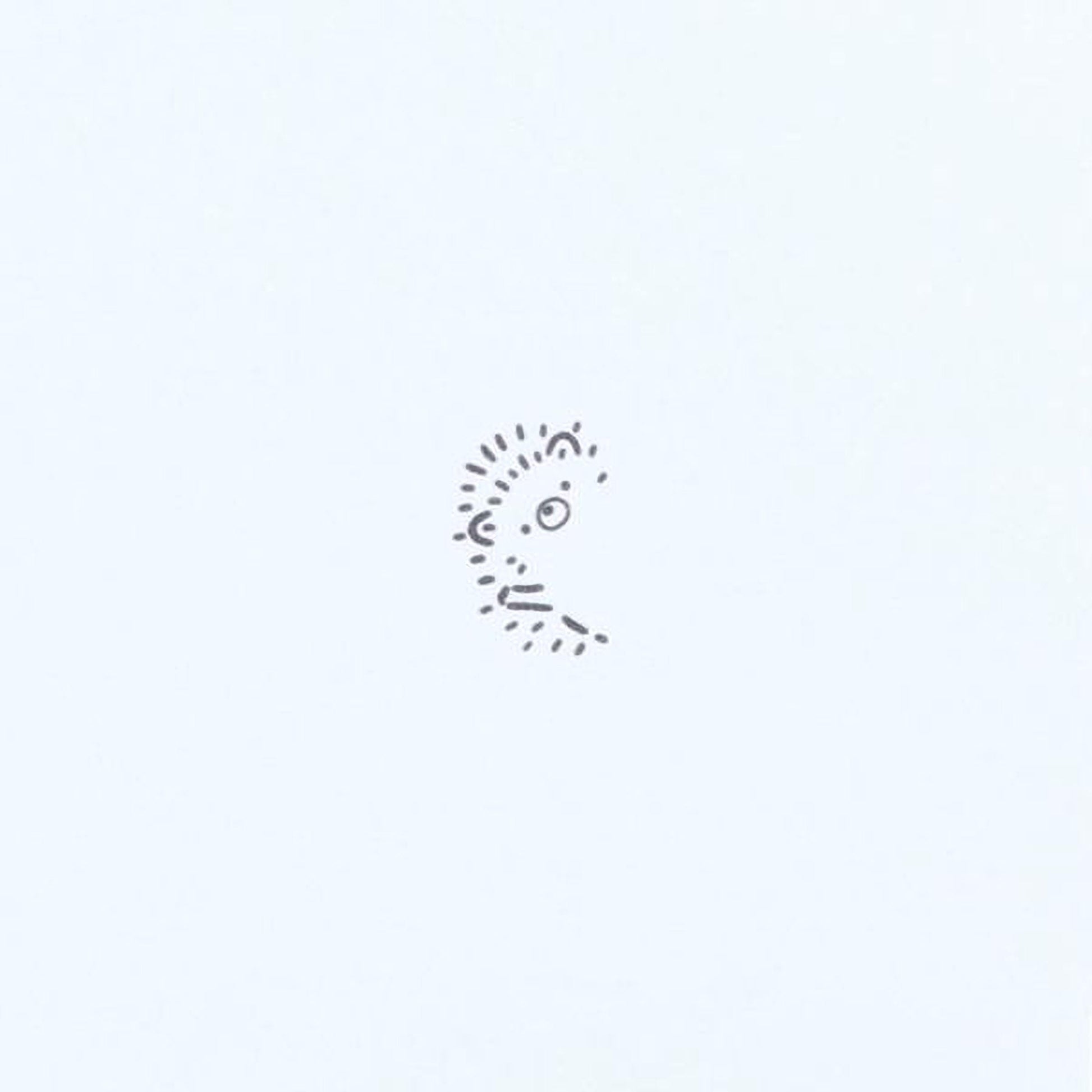 A simple black and white line drawing of a face or profile against a plain white background.