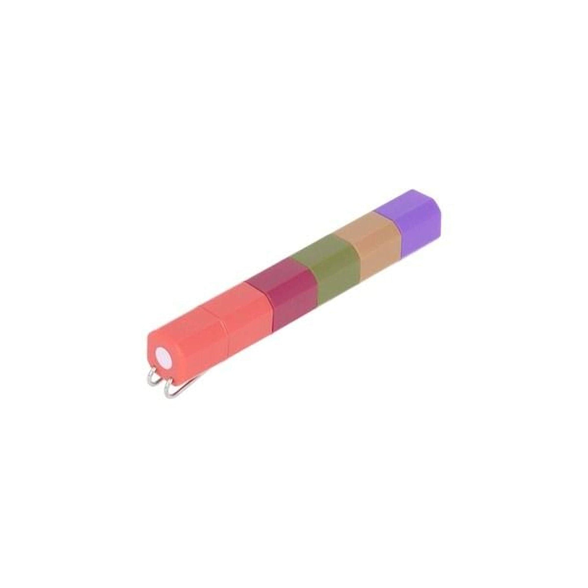 A colorful pen with a metallic cap and a small white button.