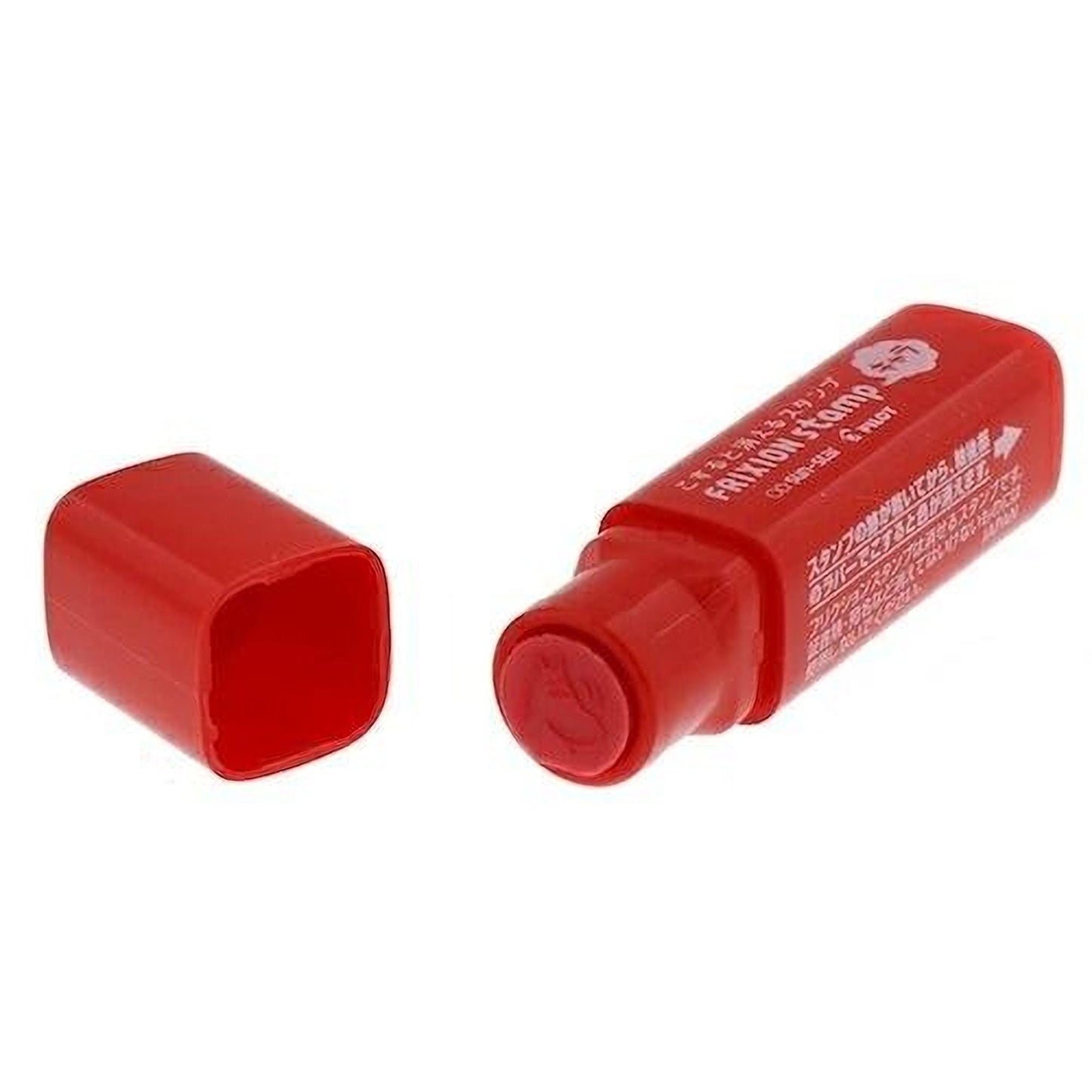 A red plastic marker with a white label, lying on its side with the cap off.