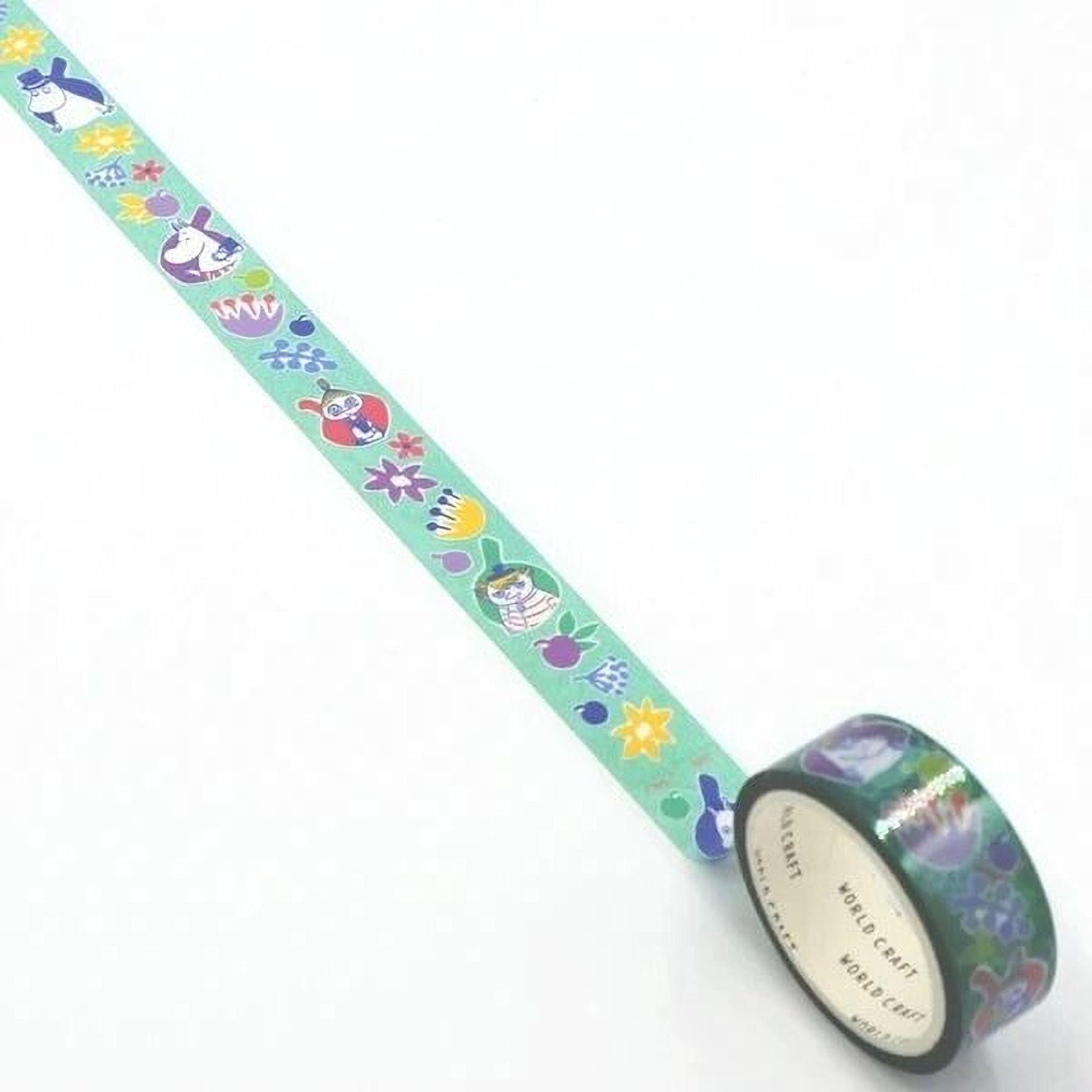 A roll of colorful patterned tape with various cartoon and floral designs on it, placed on a white surface.
