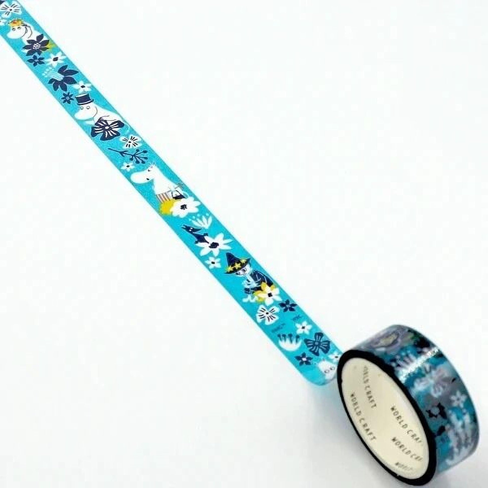 A roll of blue and white patterned tape with various designs, including flowers, snowflakes, and other winter-themed elements, is lying on a white surface.