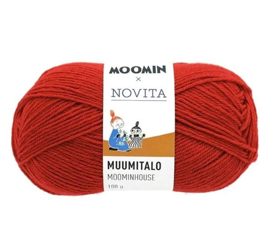 A ball of red yarn with a label that reads "Moomin x Novita Muumitalo Moominhouse 100 g" and an illustration of a character.