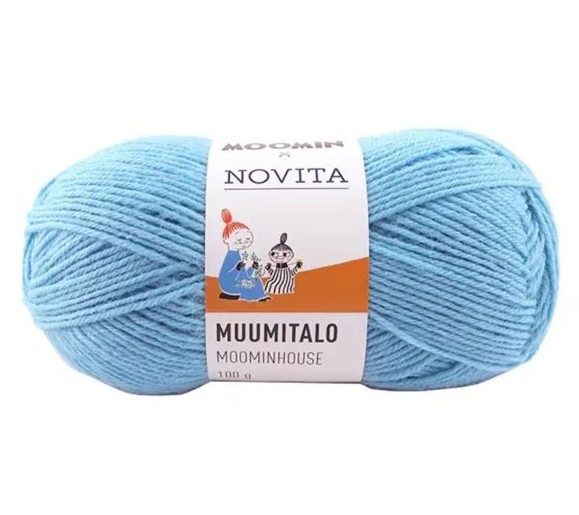 A ball of light blue yarn labeled "Moomin Novita Muumitalo Moominhouse" and weighing "100 g".