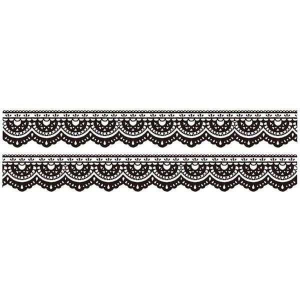 a repeating pattern of black and white lace-like designs on a white background.