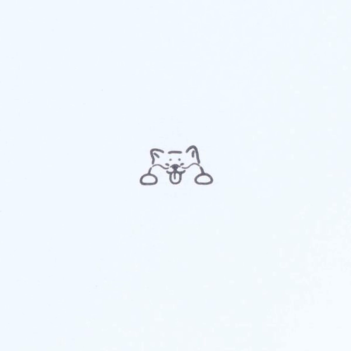 A simple line drawing of a cat's face with a small, playful expression.